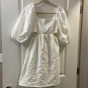 Moodie brand white puff sleeve dress, size small. New with tags.